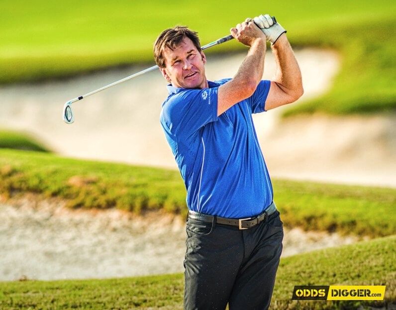 Sir Nick Faldo striking the ball