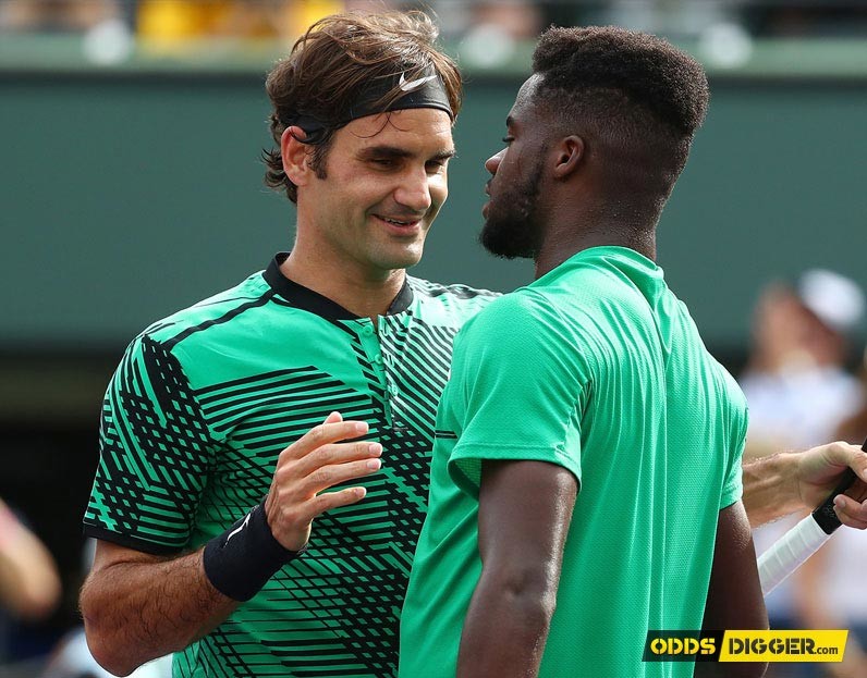 Roger Federer greeting Frances Tiafoe