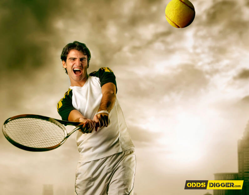 Tennis player hits the ball